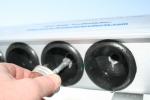 Adding antisieze-thermal paste to each collector tube: Adding antisieze-thermal paste to each collector tube openning