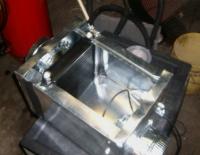 Solar Squirrel Cage Fan: Heat exchanger with fan in bottom right